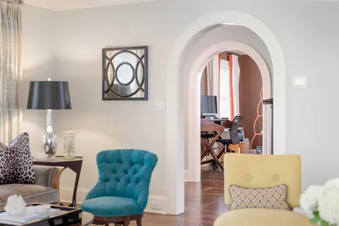 a living room with furniture and a couch