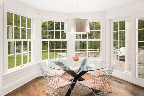 a table and chairs in a room