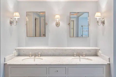 a view of a bathroom with a hallway