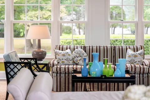 a view of a dining room with furniture window and outside view