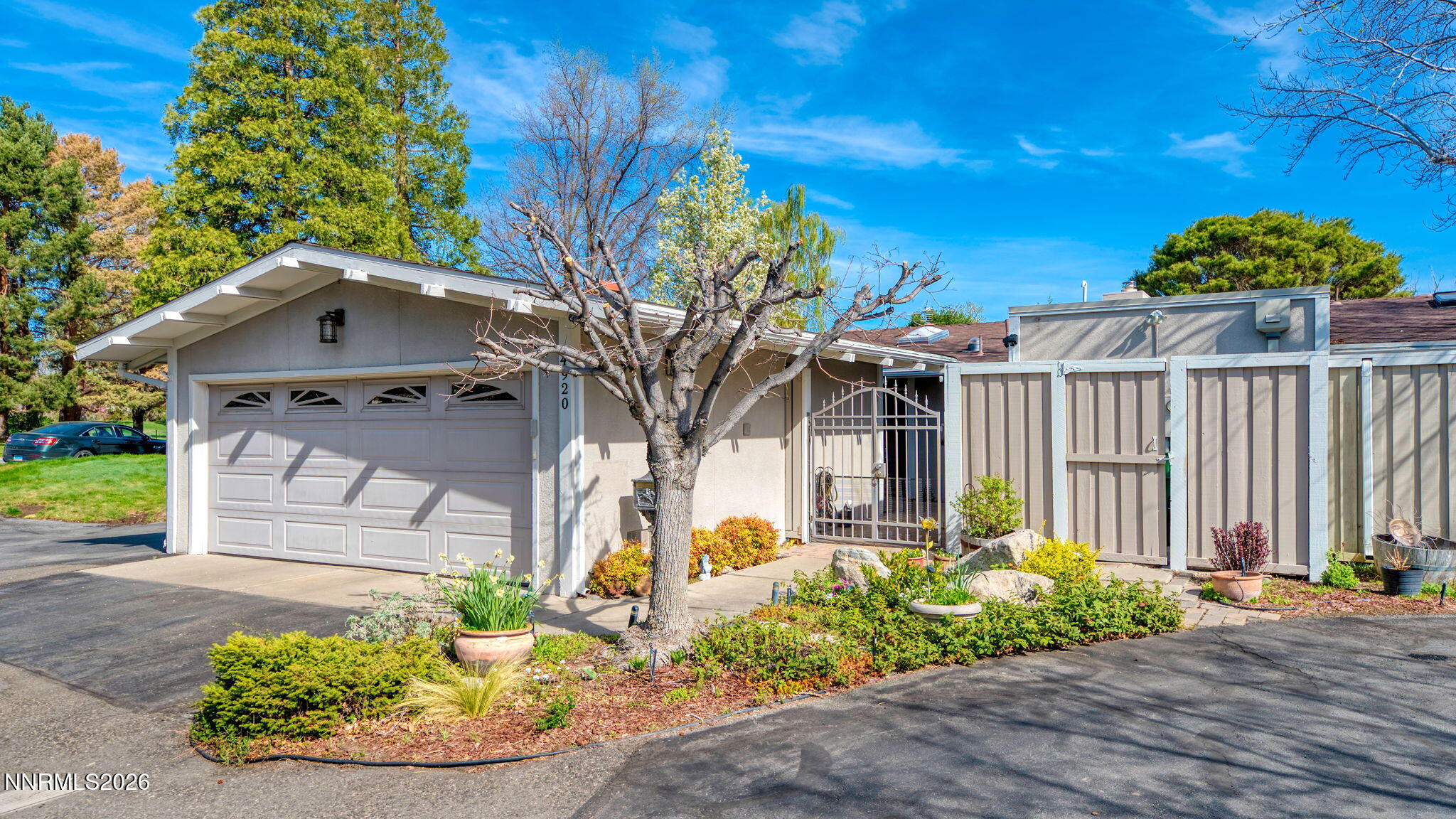 4920 Plumas Street Reno, NV 89509 - Photo 26 of 36 a front view of a house with a yard