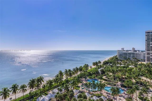 a view of a large building with a garden