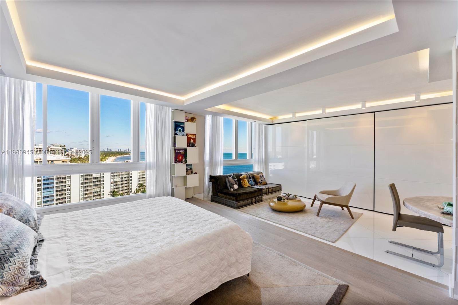 791 Crandon Boulevard, Unit 1408 Key Biscayne, FL 33149 - Photo 25 of 54 a bedroom with furniture and a window