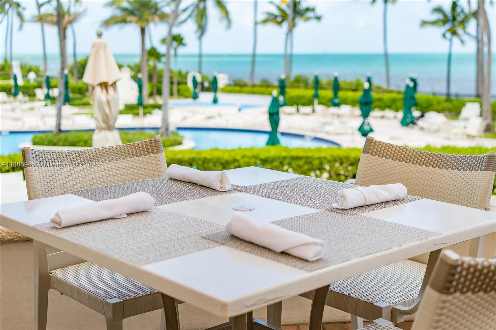 791 Crandon Boulevard, Unit 1408 Key Biscayne, FL 33149 - Photo 30 of 54 a view of an outdoor space with seating area