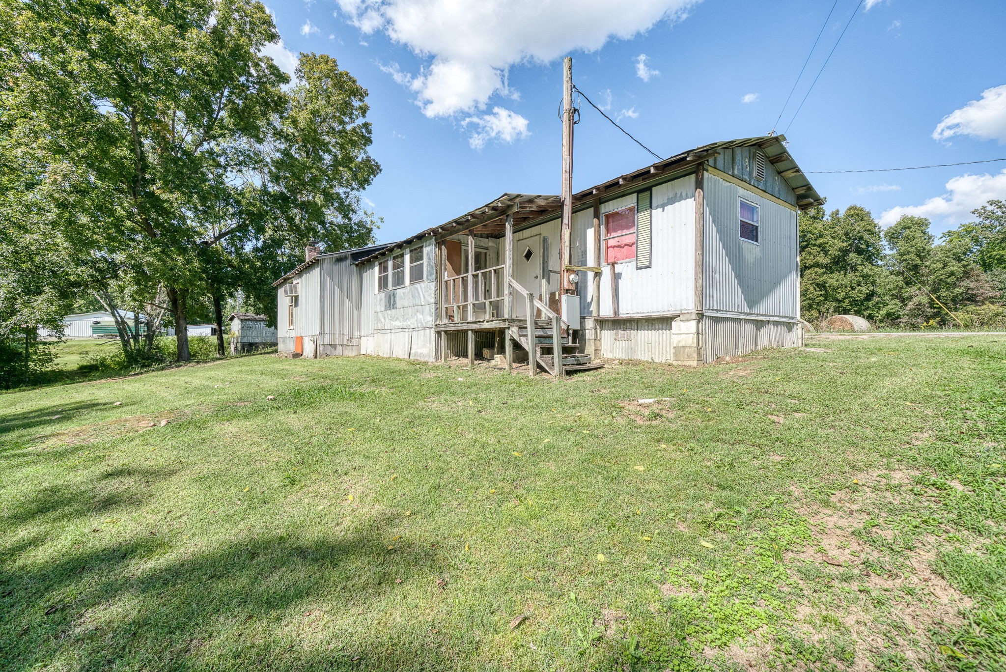 7331 Ashburn Road Baxter, TN 38544 - Photo 39 of 62 a front view of a house with garden