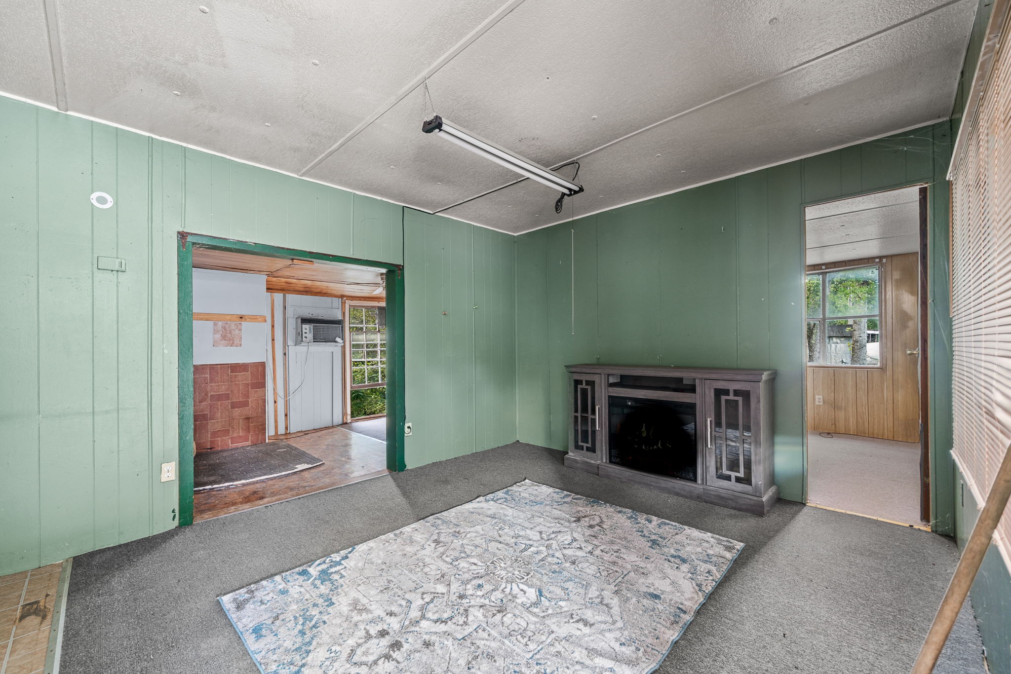 7331 Ashburn Road Baxter, TN 38544 - Photo 42 of 62 a view of a livingroom with a fireplace and window