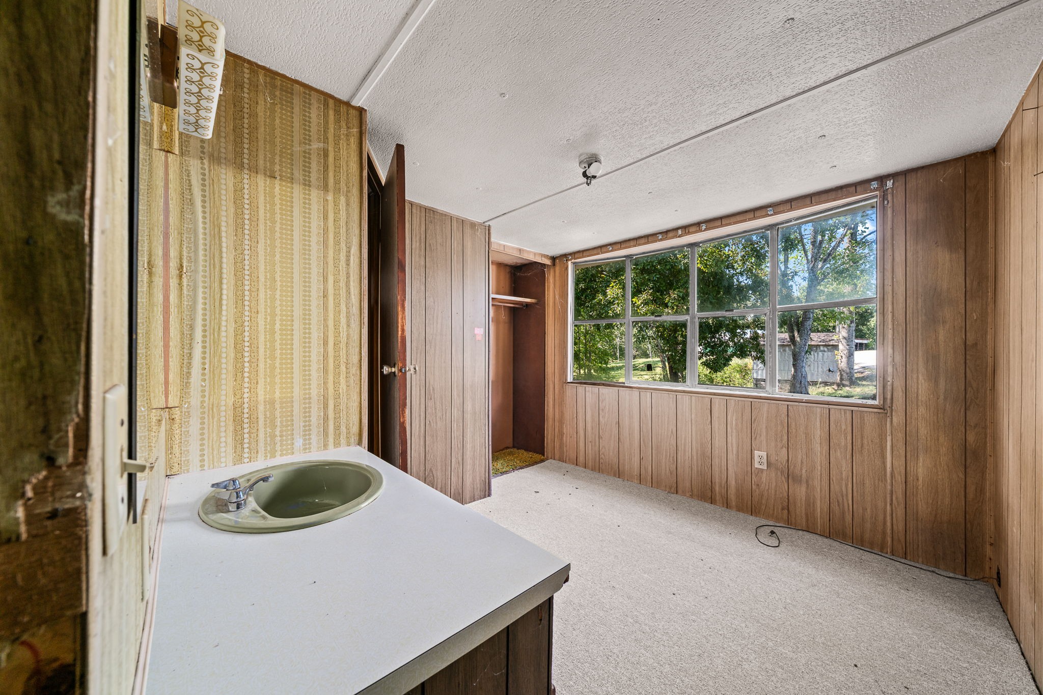7331 Ashburn Road Baxter, TN 38544 - Photo 43 of 62 a view of a kitchen with a sink and dishwasher
