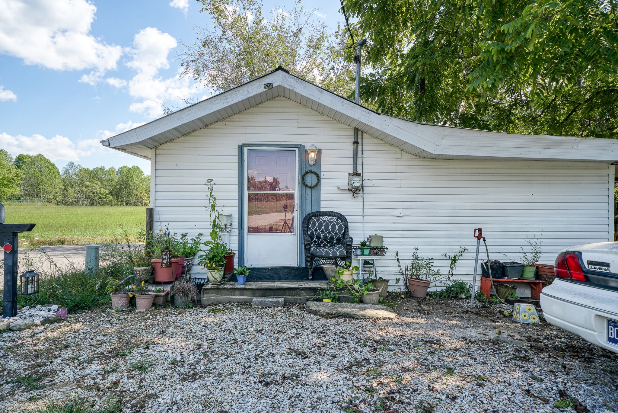7331 Ashburn Road Baxter, TN 38544 - Photo 53 of 62 a front view of a house with garden