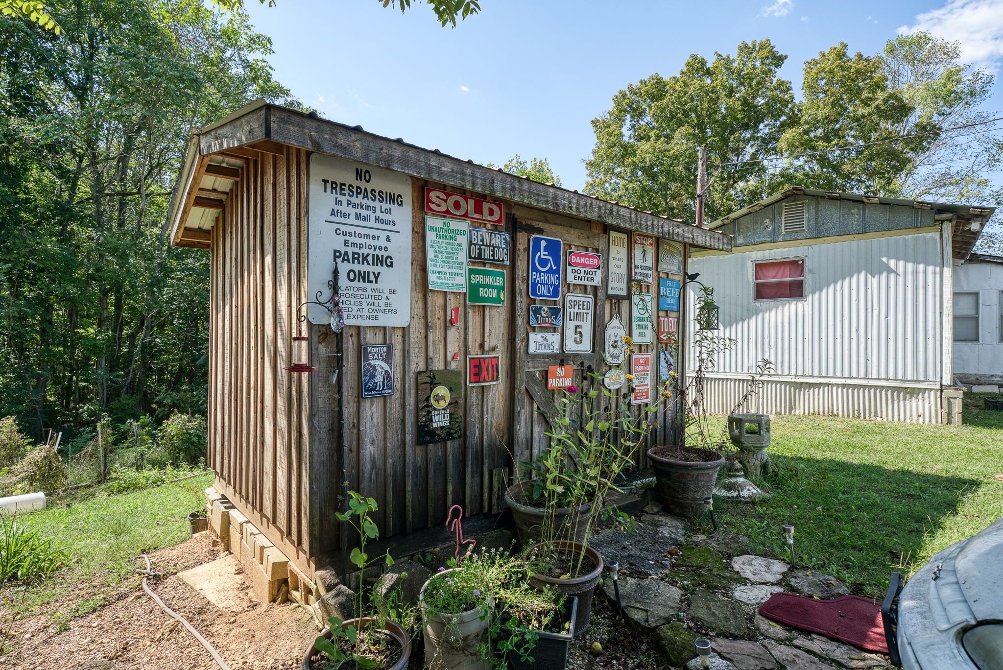 7331 Ashburn Road Baxter, TN 38544 - Photo 56 of 62 a view of a house with a yard and plants