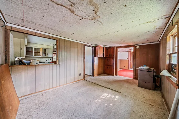 a view of front door with wooden floor