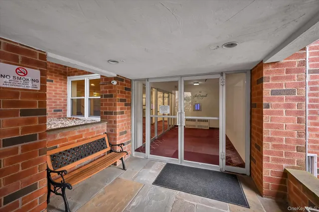 a view of a livingroom with furniture and staircase