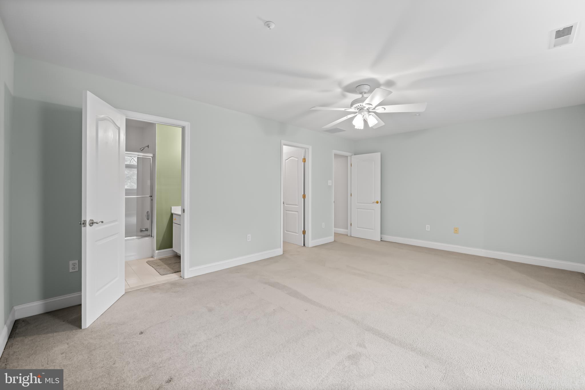 24 Roland Green, Unit 12 Baltimore, MD 21210 - Photo 34 of 53 a view of an empty room with a ceiling fan
