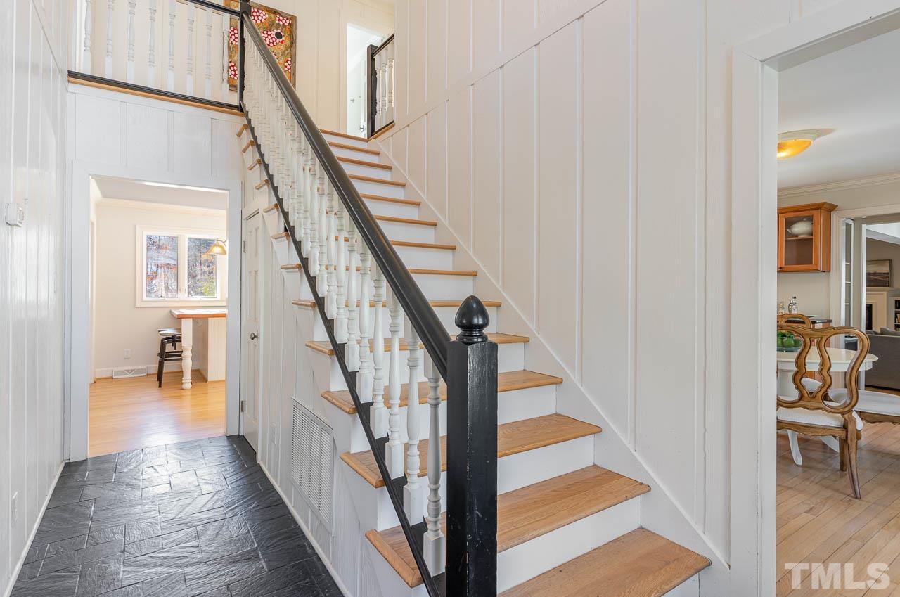 113 Bruce Drive Cary, NC 27511 - Photo 15 of 48 a view of entryway and hall with wooden floor