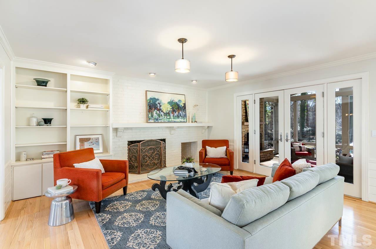 113 Bruce Drive Cary, NC 27511 - Photo 19 of 48 a living room with furniture fireplace and a large window