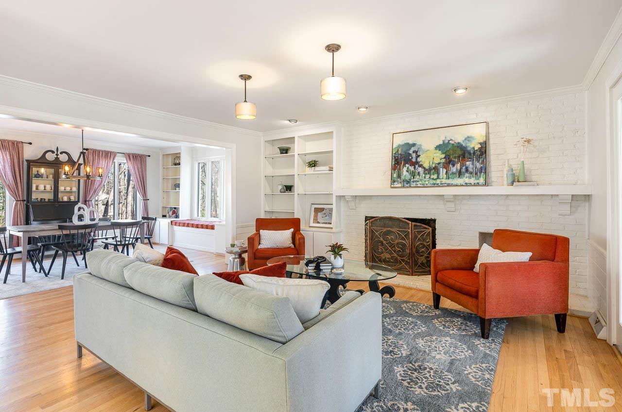 113 Bruce Drive Cary, NC 27511 - Photo 20 of 48 a living room with furniture and a fireplace