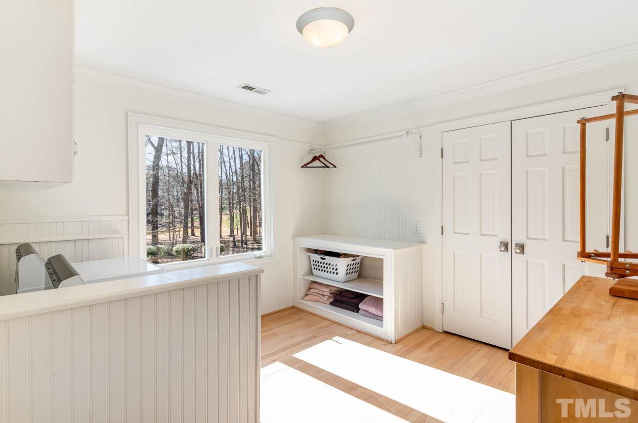 113 Bruce Drive Cary, NC 27511 - Photo 35 of 48 a view of a kitchen with a sink dishwasher and a refrigerator