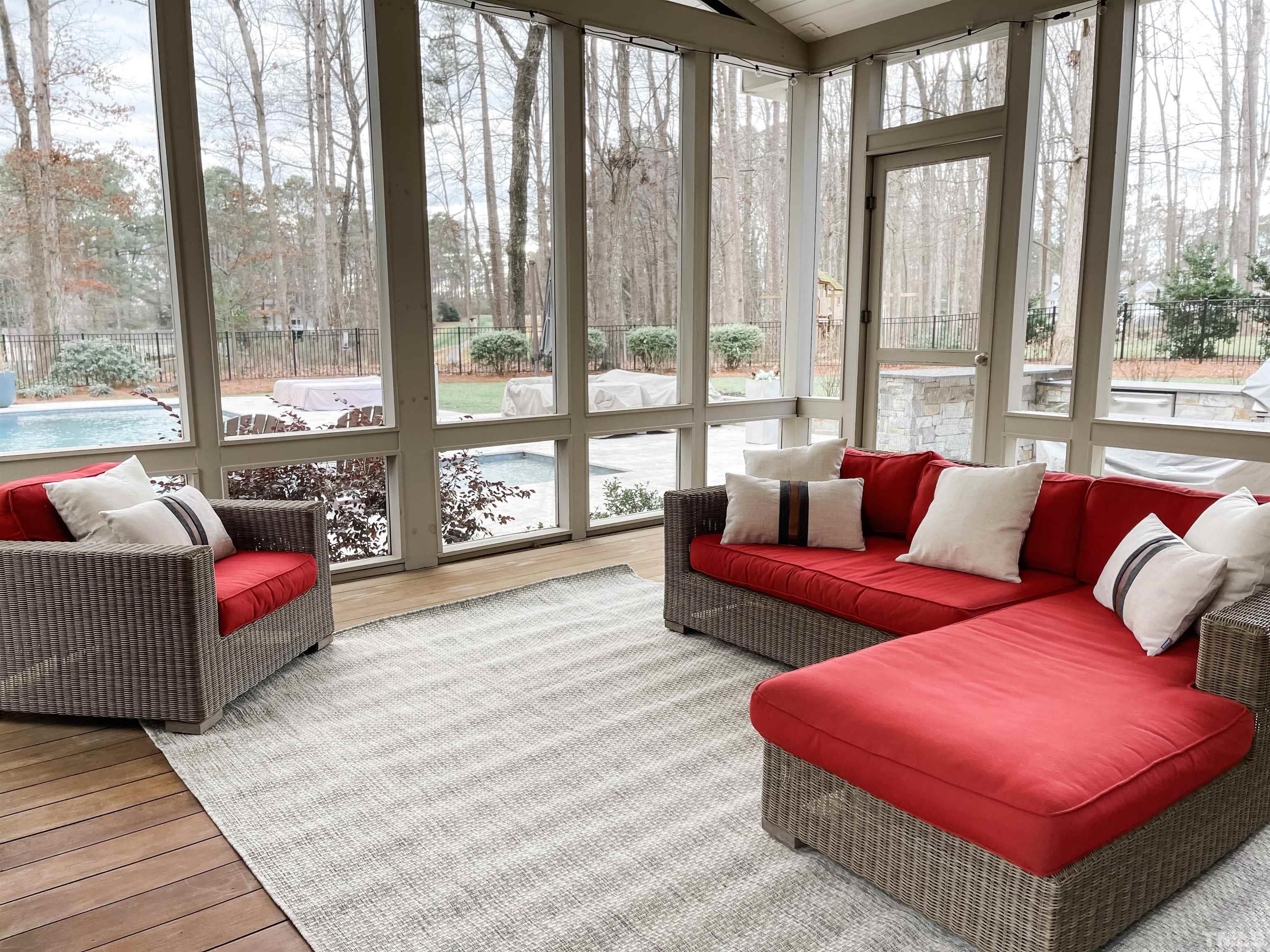 113 Bruce Drive Cary, NC 27511 - Photo 10 of 48 a living room with furniture and a floor to ceiling window