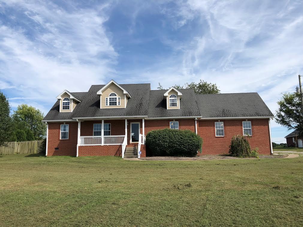 2918 Academy Road Portland, TN 37148 - Photo 1 of 26 front view of a house with a yard