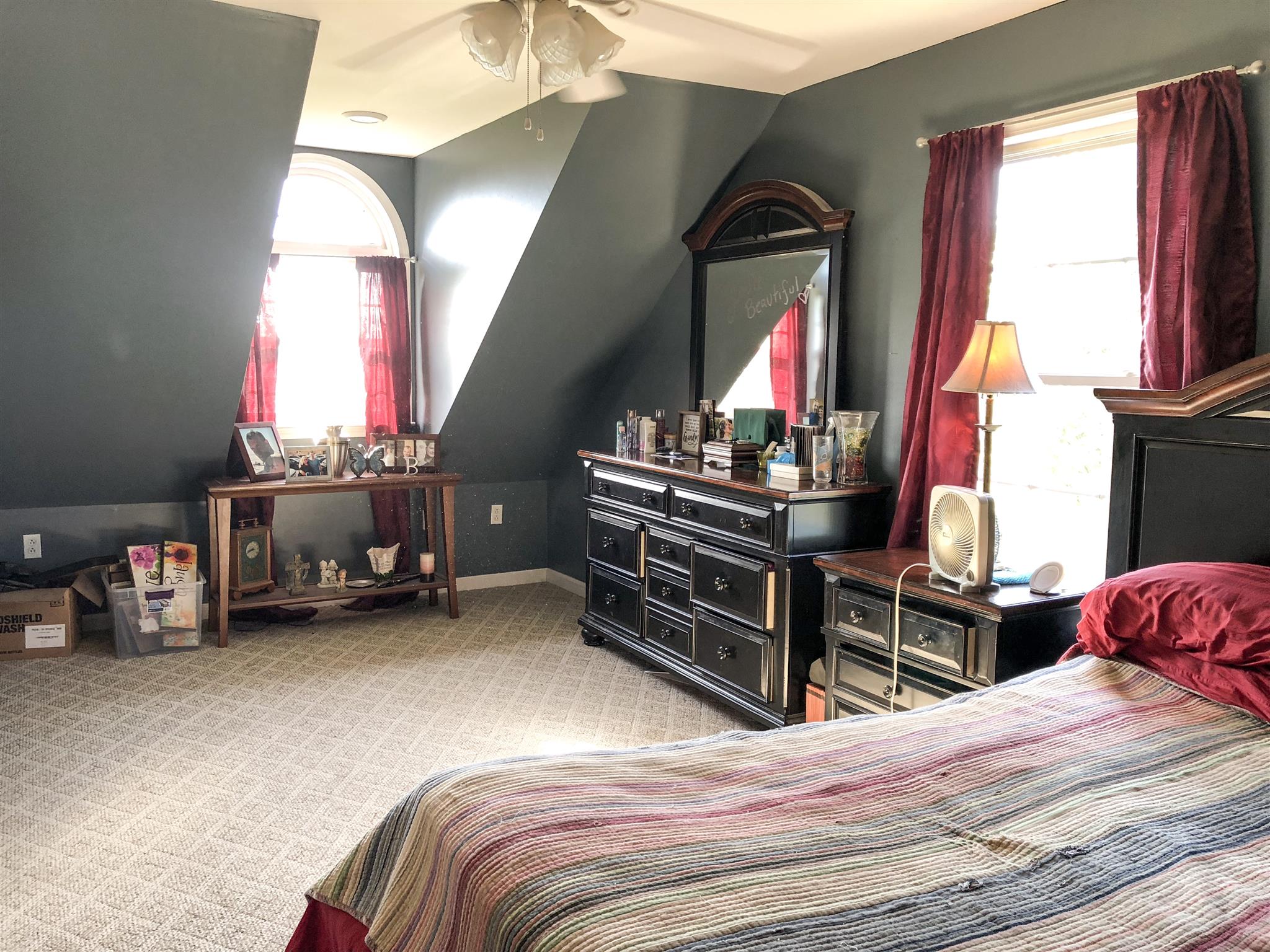 2918 Academy Road Portland, TN 37148 - Photo 14 of 26 a bedroom with a bed and dresser with mirror
