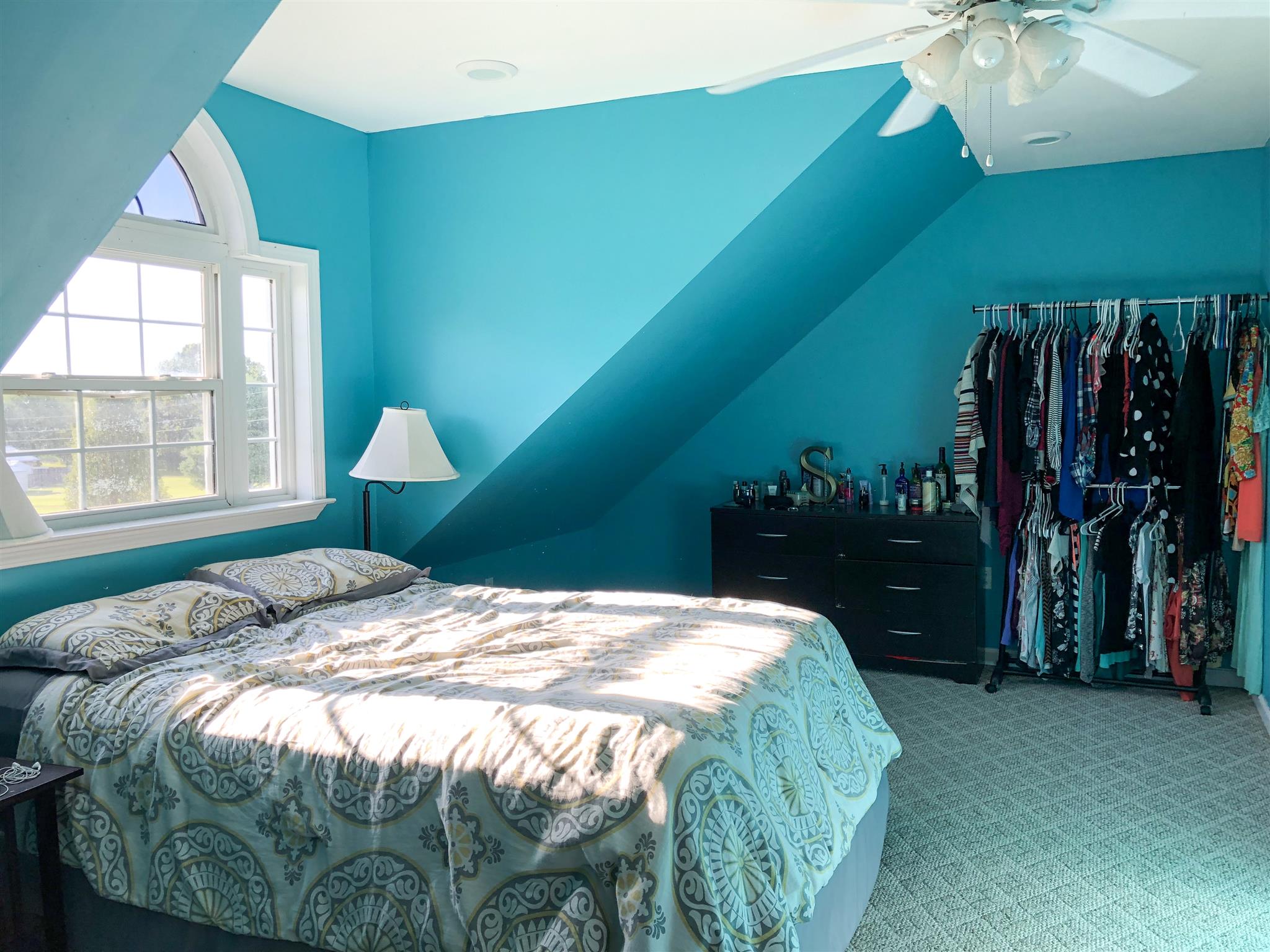 2918 Academy Road Portland, TN 37148 - Photo 25 of 26 a bed sitting in a bedroom next to a window