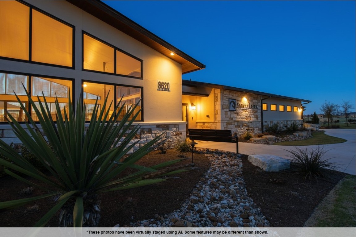 131 Furlong Drive Georgetown, TX 78626 - Photo 24 of 36 View of front of house with stone siding and stucco siding
