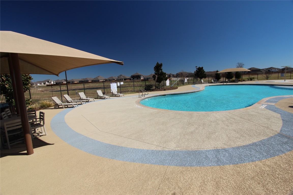 131 Furlong Drive Georgetown, TX 78626 - Photo 25 of 36 Community club house, pool, lake, bike trails and park.