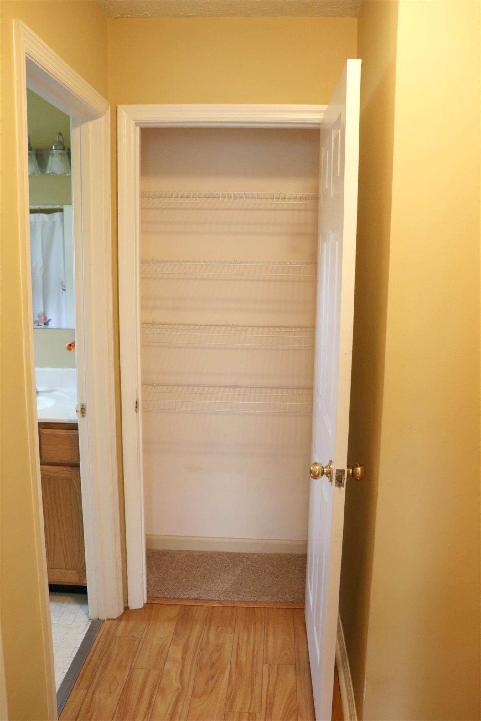638 Bates Road Lebanon, TN 37087 - Photo 22 of 23 a view of walk in closet with wooden floor