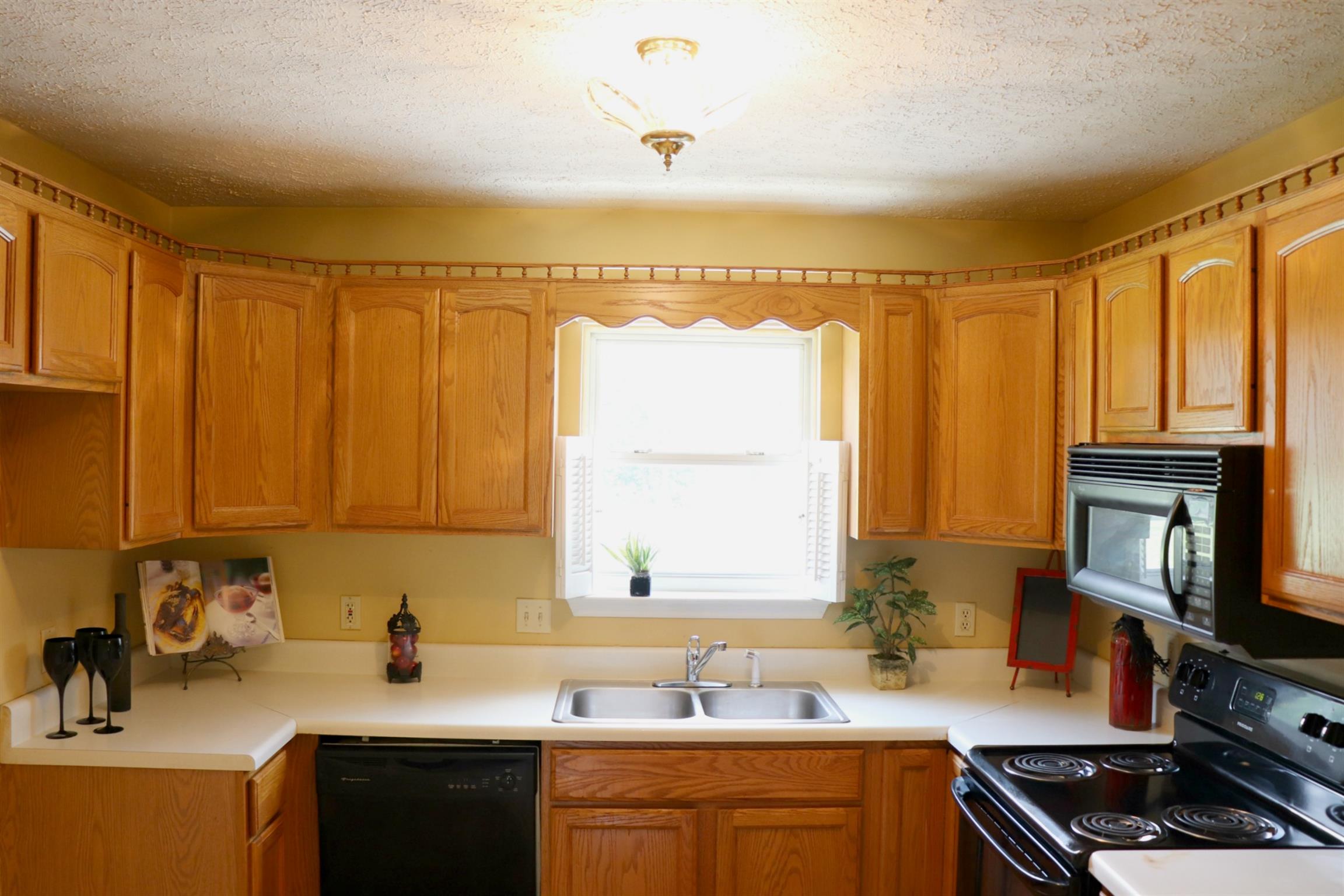 638 Bates Road Lebanon, TN 37087 - Photo 5 of 23 a kitchen with a sink cabinets and a window