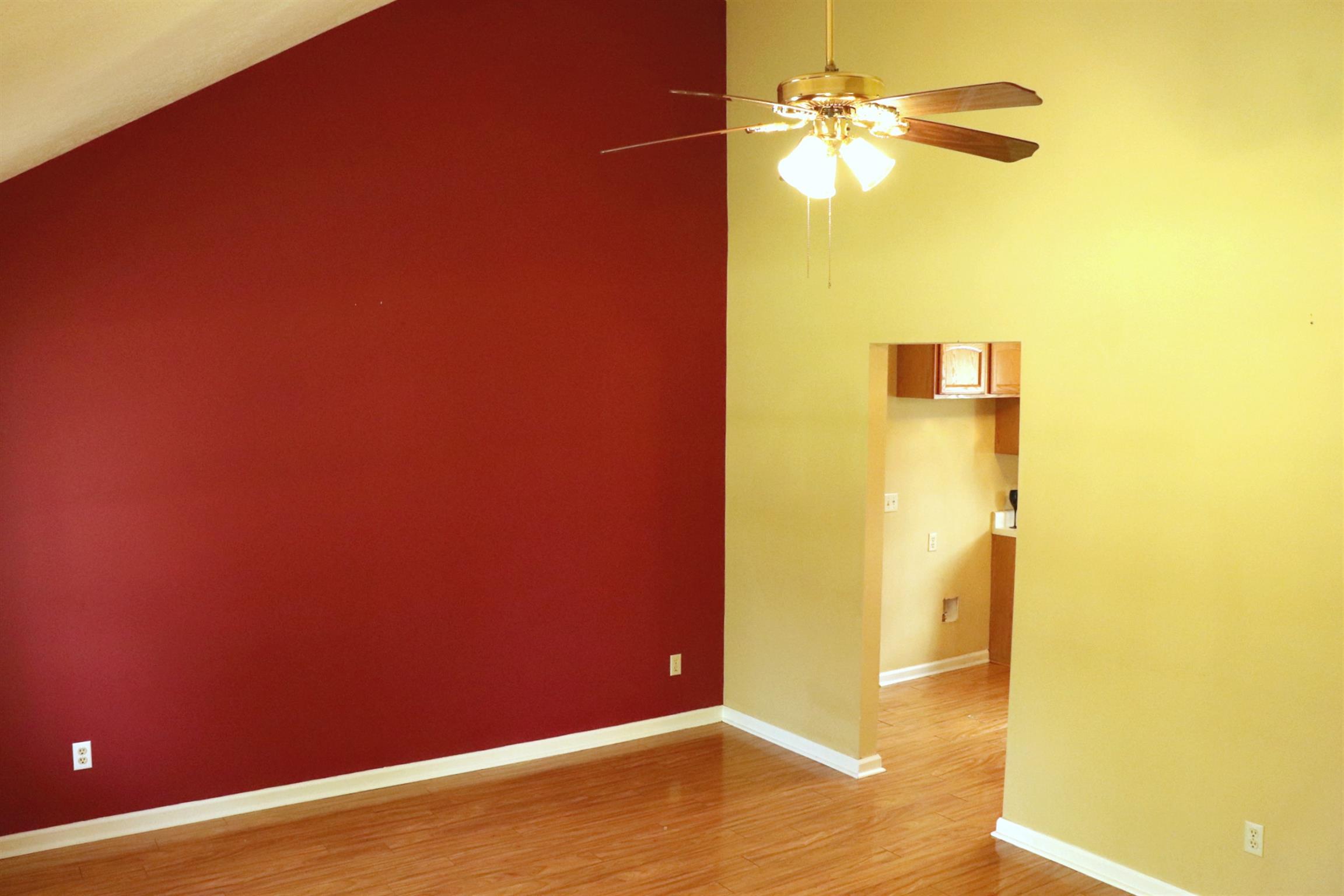 638 Bates Road Lebanon, TN 37087 - Photo 8 of 23 a view of a big room with a ceiling fan and carpet