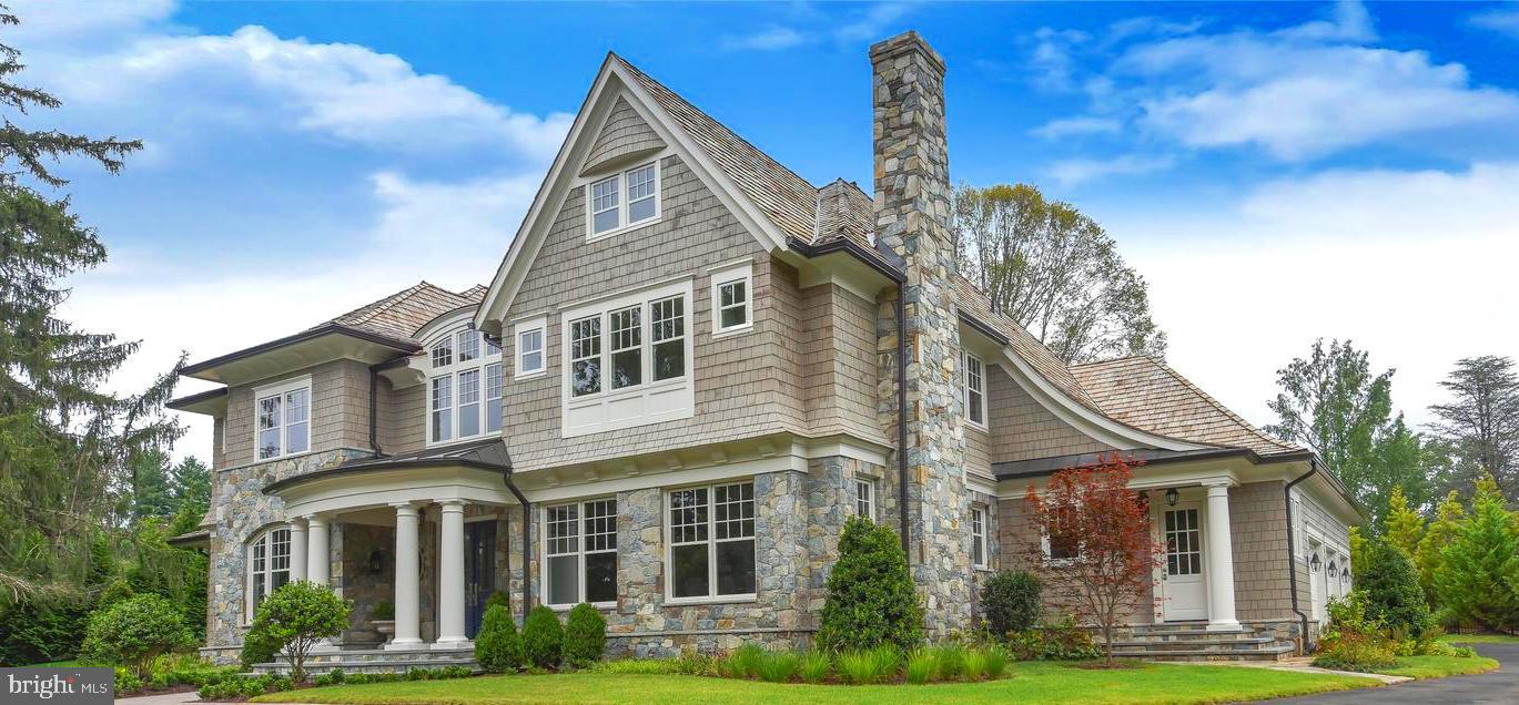 1339 Hawkin Road McLean, VA 22102 - Photo 7 of 10 a front view of a house with garden