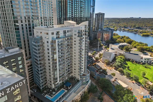 a view of a swimming pool with chairs