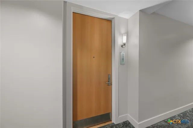 a workspace with furniture and wooden floor