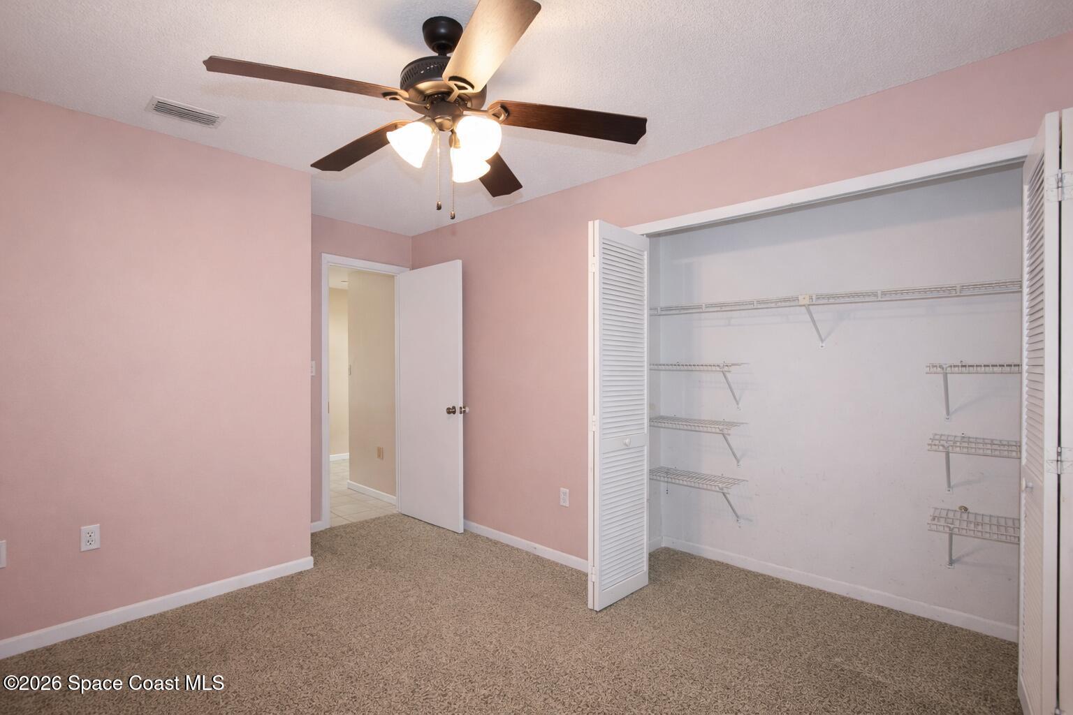 819 Gardener Road Rockledge, FL 32955 - Photo 26 of 33 819 Gardener bedroom 3 with closet