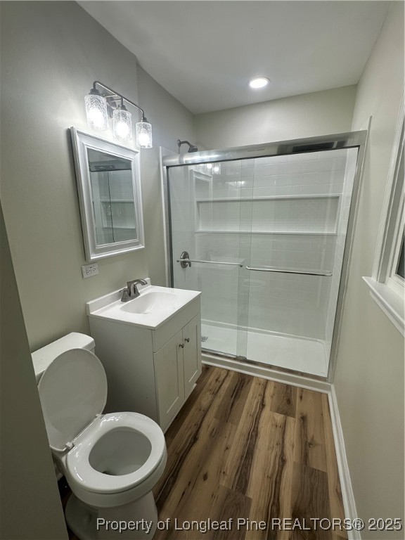 411 Lafayette Street Clinton, NC 28328 - Photo 21 of 24 a bathroom with a sink mirror vanity and toilet