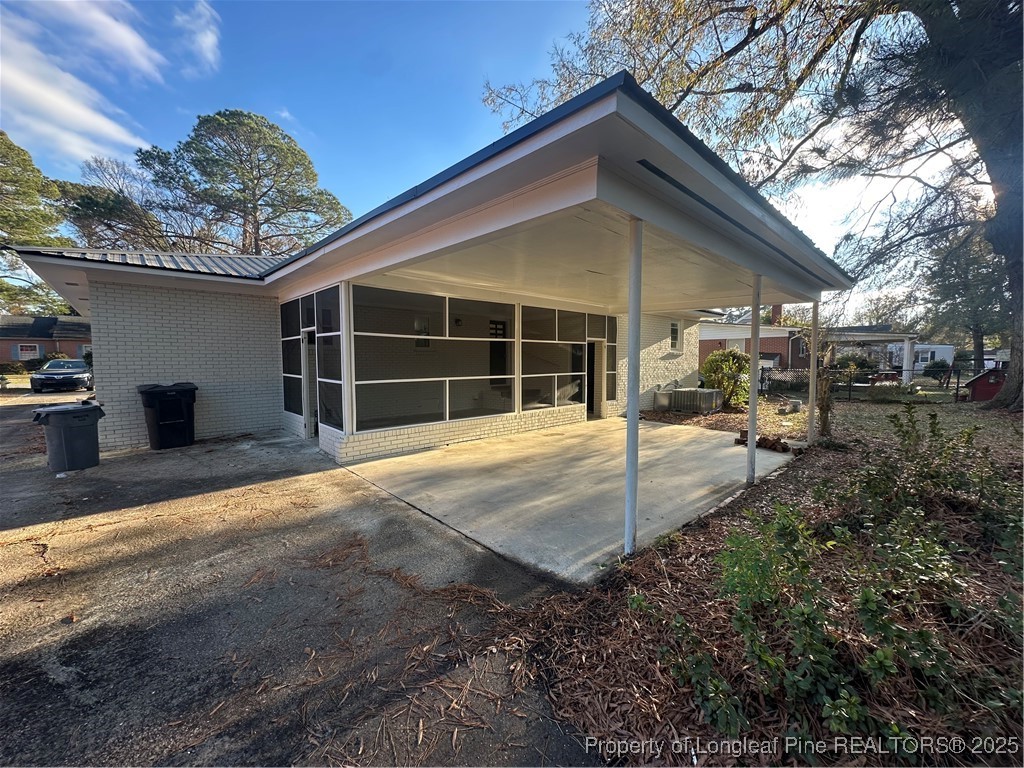 411 Lafayette Street Clinton, NC 28328 - Photo 23 of 24 a view of a house with a outdoor space