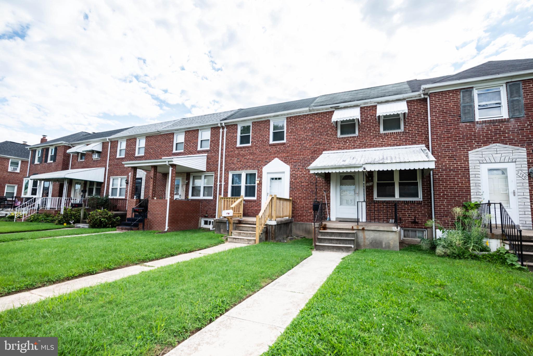 Charming brick townhomes in a row.