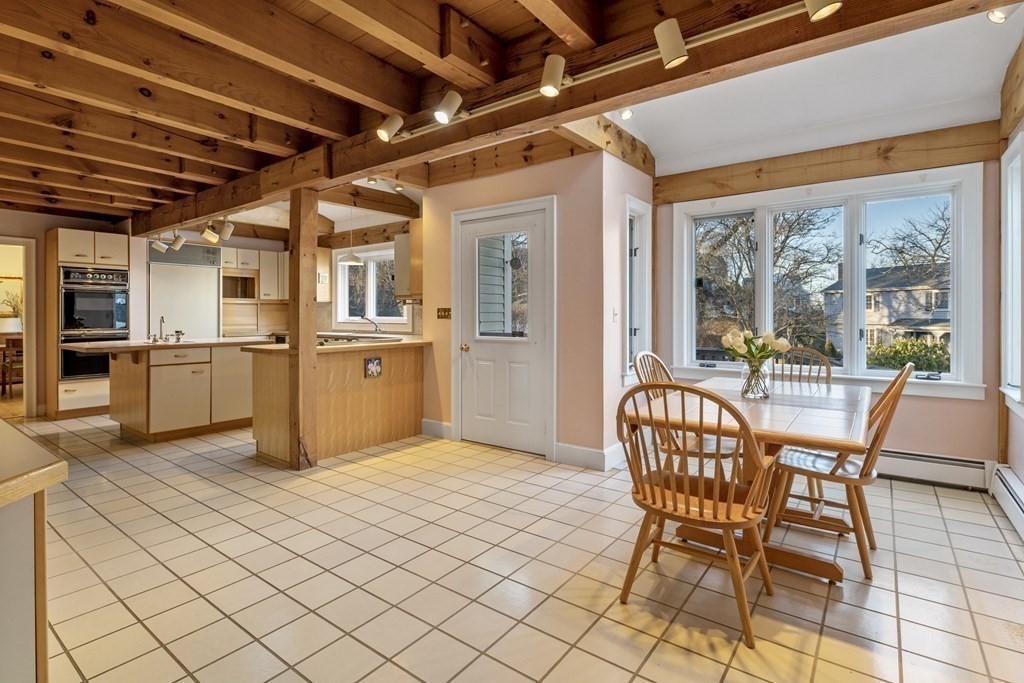 8 Edgemere Road Marblehead, MA 01945 - Photo 12 of 41 a view of a chairs and table in a patio