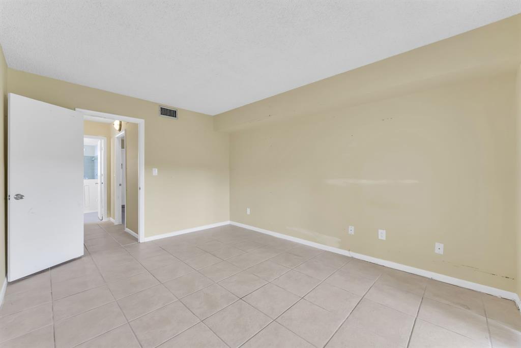 331 Northwest 76th Avenue, Unit 104 Margate, FL 33063 - Photo 14 of 30 a view of an empty room