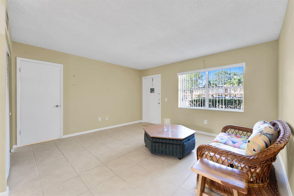 331 Northwest 76th Avenue, Unit 104 Margate, FL 33063 - Photo 10 of 30 a view of a livingroom with furniture