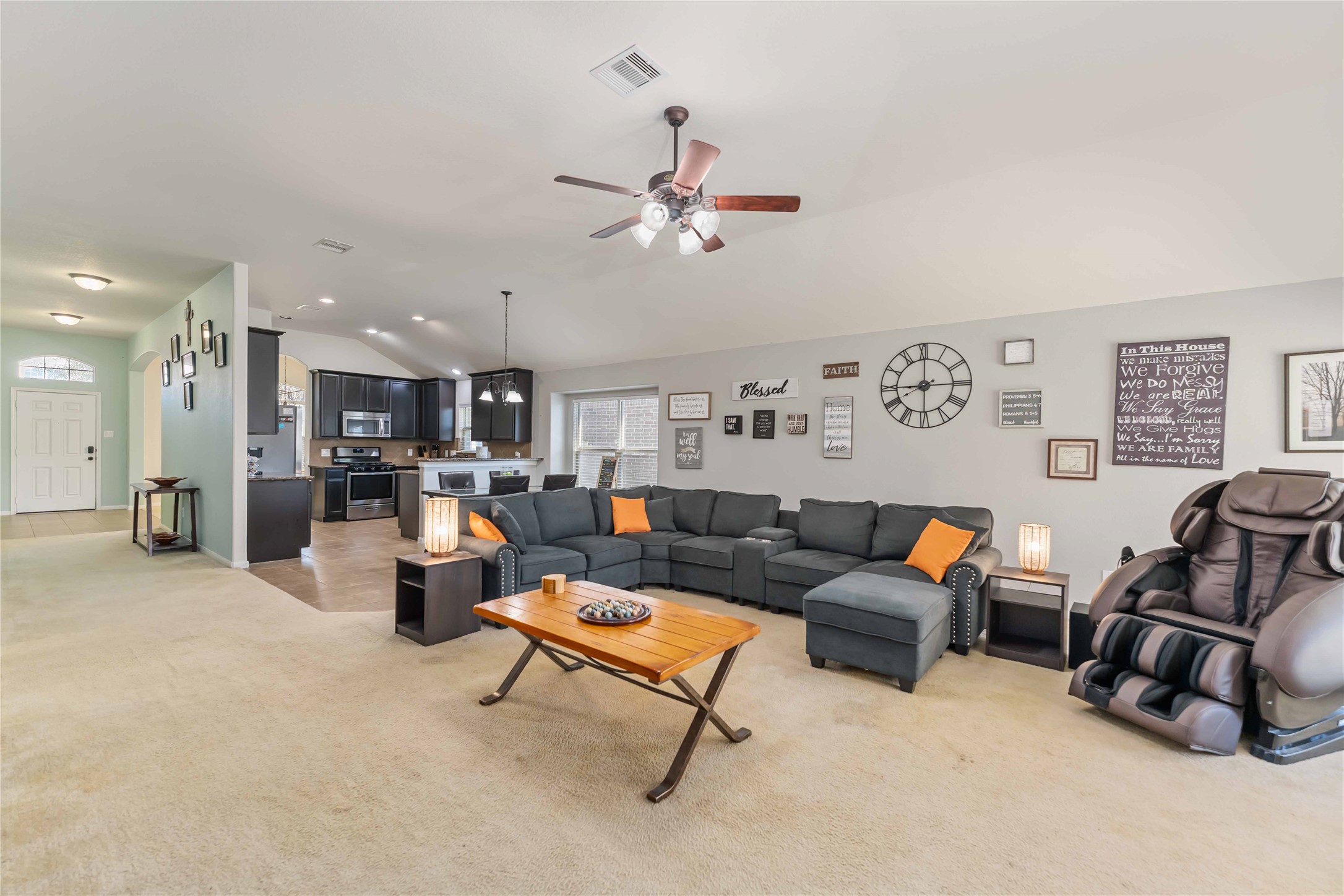 8226 Silent Deep Drive Rosenberg, TX 77469 - Photo 10 of 23 a living room with furniture and kitchen view