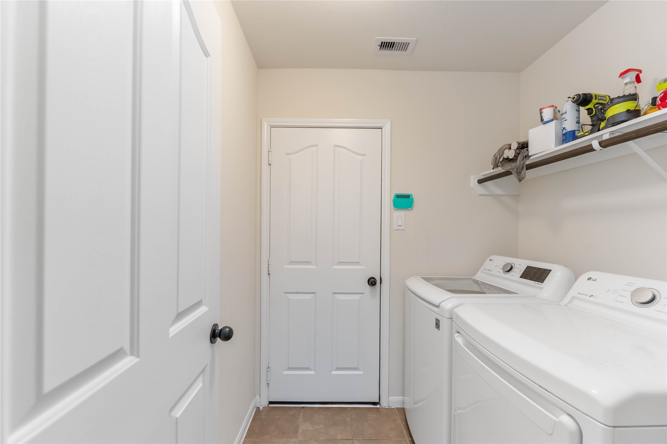 8226 Silent Deep Drive Rosenberg, TX 77469 - Photo 19 of 23 a view of utility room