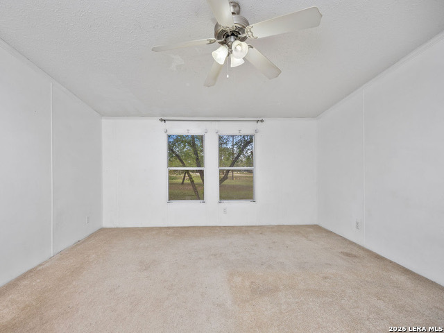 135 Savannah Ridge Von Ormy, TX 78073 - Photo 29 of 45 an empty room with a window