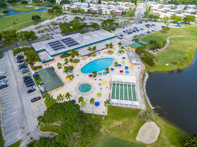 20 Saxony A, Unit A Delray Beach, FL 33446 - Photo 23 of 50 a view of outdoor space yard and outdoor seating