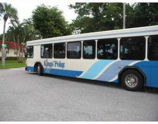 a view of a cafe with sitting area