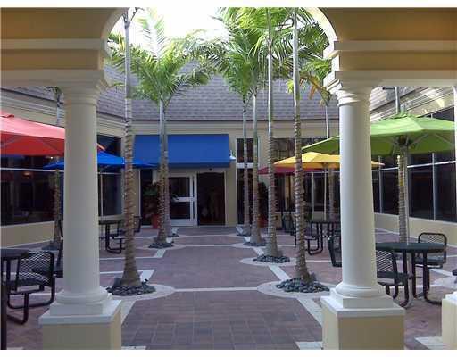 20 Saxony A, Unit A Delray Beach, FL 33446 - Photo 35 of 50 a view of a cafe with sitting area
