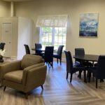 20 Saxony A, Unit A Delray Beach, FL 33446 - Photo 44 of 50 a living room with furniture wooden floor and a dining table