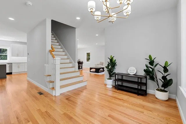 a view of a living room and wooden floor