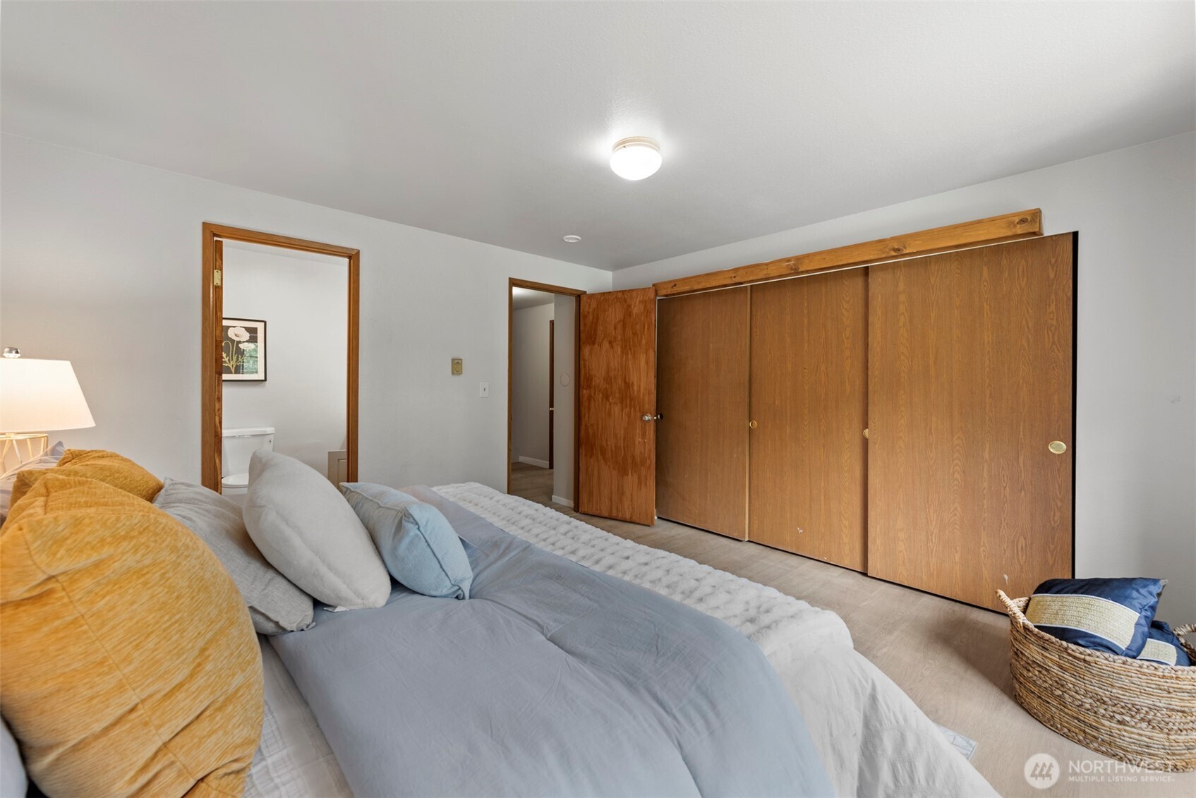 4302 155th Street Southwest Lynnwood, WA 98087 - Photo 12 of 19 a bedroom with a bed and a closet