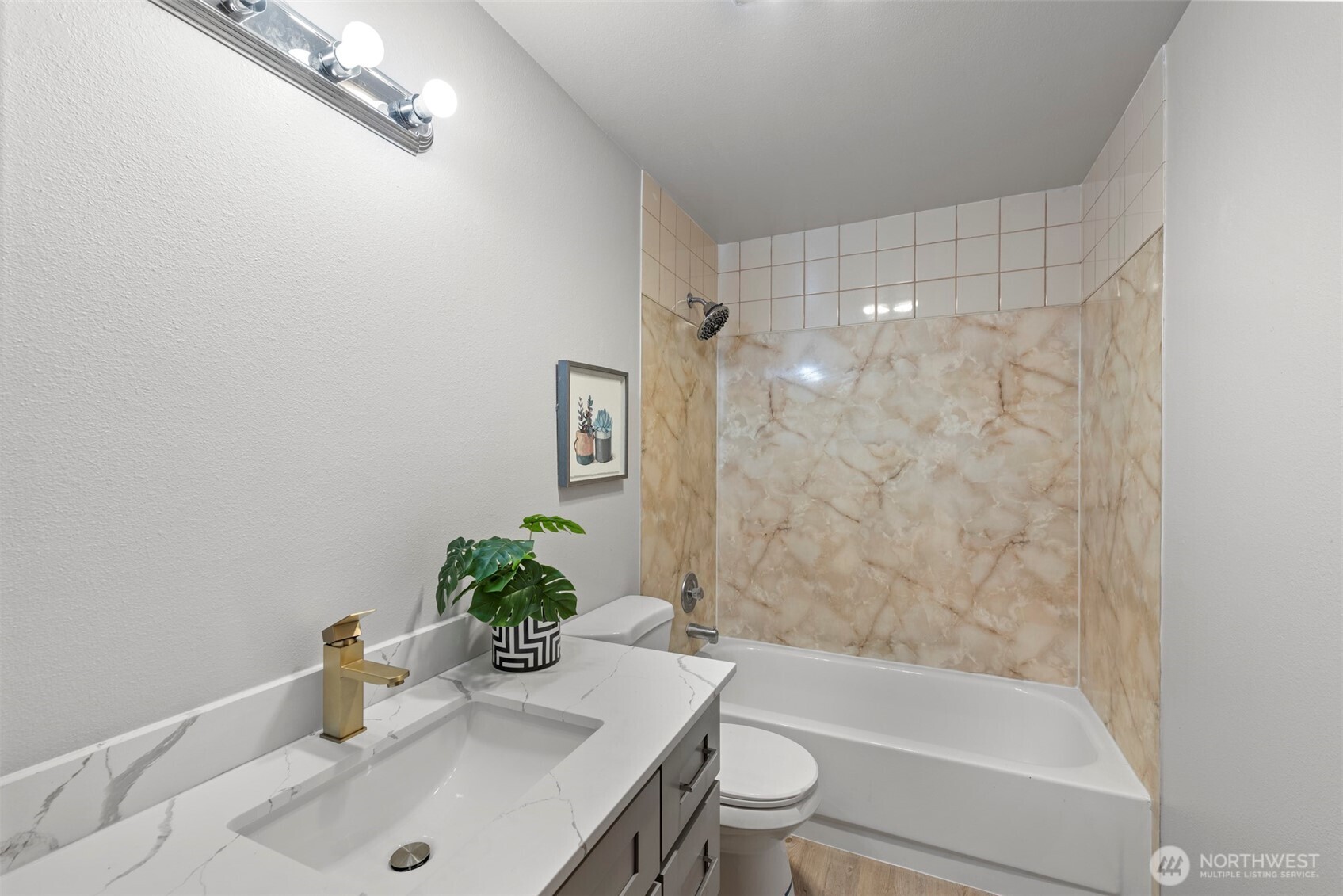 4302 155th Street Southwest Lynnwood, WA 98087 - Photo 16 of 19 a bathroom with a sink a toilet and shower