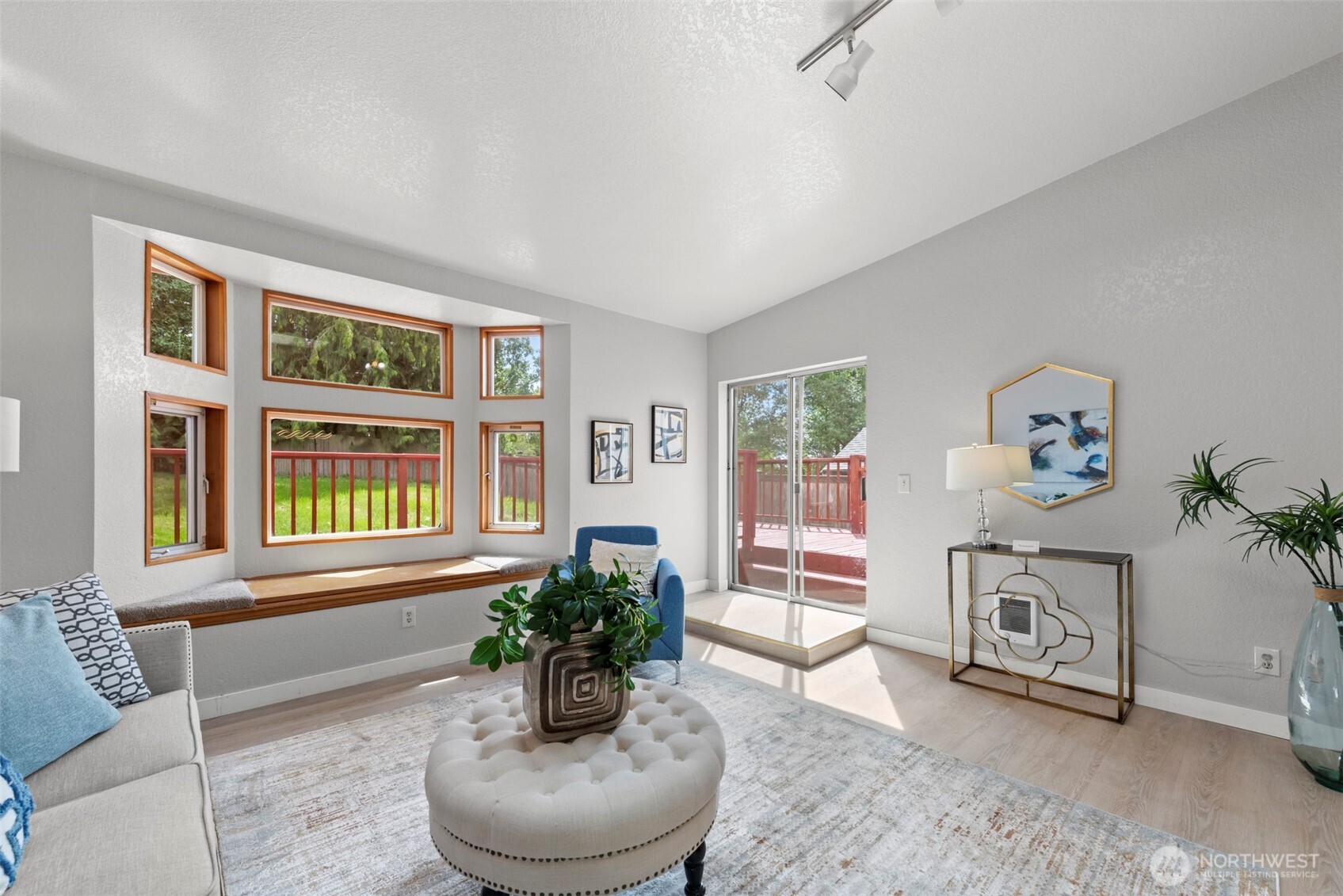 4302 155th Street Southwest Lynnwood, WA 98087 - Photo 3 of 19 a living room with furniture and a potted plant